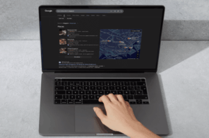 A laptop screen displaying a Google search for "best restaurants in Singapore" with a local map pack, illustrating how restaurants appear in search results.