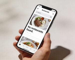 A smartphone screen displaying a Google search with no restaurant listing appearing in the results, suggesting poor online visibility or SEO issues.