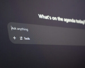 An AI-style search bar interface resembling a chatbot, representing an intelligent digital assistant designed to answer questions and provide recommendations instantly.