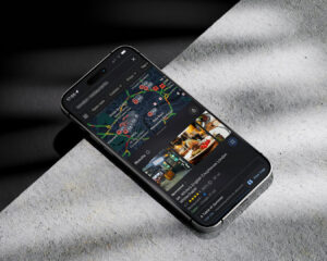 Smartphone displaying a Google Maps view with a restaurant location, star ratings, and customer reviews visible.